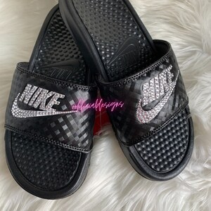 Price of hot sale original nike slippers