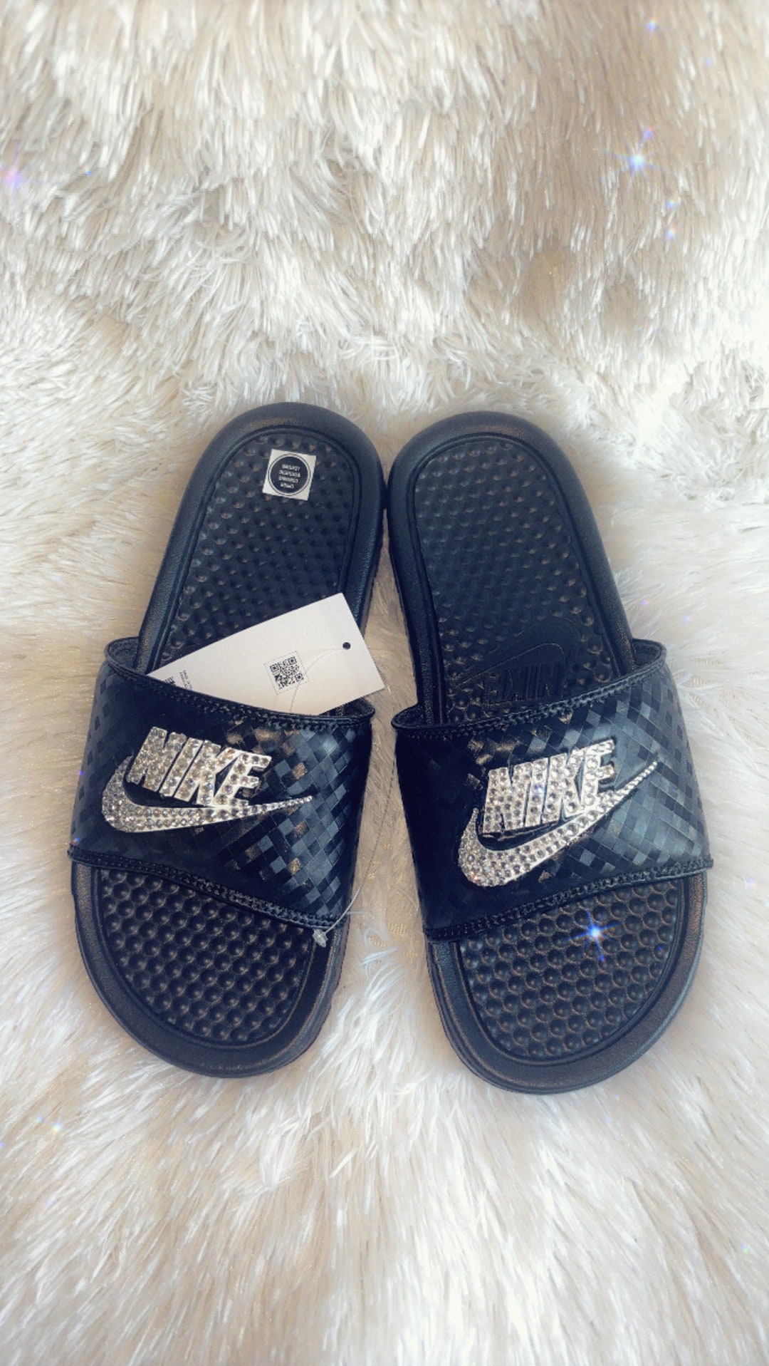 black and blue nike slides