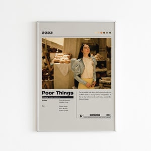 May include: A movie poster for the film "Poor Things" with a 2023 release date. The poster features a woman with long black hair wearing a light blue jacket with large puffed sleeves, a white blouse, and a yellow skirt. The woman is standing in a market with a variety of breads in the background. The poster also includes the film's title, director, writers, and stars.