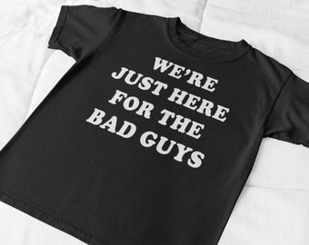 We're Just Here For The Bad Guys Movie T-Shirt. The Dirties Novelty Independent Film Shirt. Cult Classic. Funny Saying T-Shirt. Movie Cinema