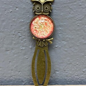 Handmade unique bookmark made with dried flowers.