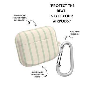 May include: A white and green striped AirPod case with a silver carabiner. The case is labeled "DROP-PROOF. SCRATCH-PROOF. LIFE-PROOF." and "HIGH QUALITY FADE RESISTANT PRINTS." The text "PROTECT THE BEAT. STYLE YOUR AIRPODS." is also visible.