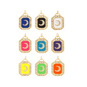 May include: Nine gold pendant charms with a crescent moon design. Each charm has a different colored enamel background: blue, black, white, pink, turquoise, purple, yellow, green, and orange.