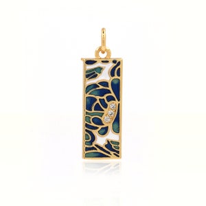 May include: Gold pendant with a blue and white enamel design featuring a floral pattern and three small clear stones.