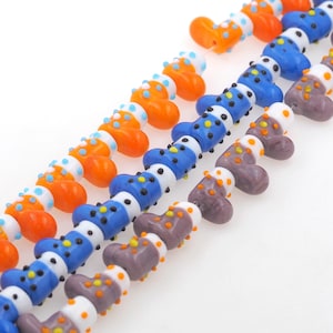 Cuentas de cerámica para zapatos, cuentas exquisitas, cuentas de cerámica para zapatos, fabricación de joyas DIY, 1 tira de 25