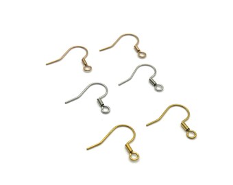May include: Five earring hooks in different colors: gold, silver, and rose gold. The hooks are made of metal and have a simple design.