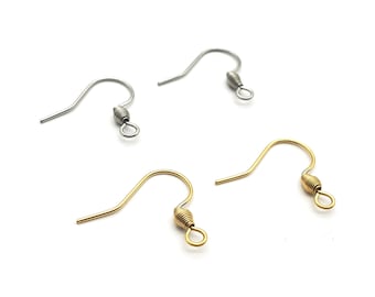 May include: Four earring hooks in silver and gold tones. The hooks have a curved design with a coiled spring detail and a small loop at the bottom. The hooks are for jewelry making.