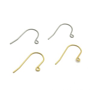May include: Two pairs of earring hooks, one pair is silver and the other pair is gold.