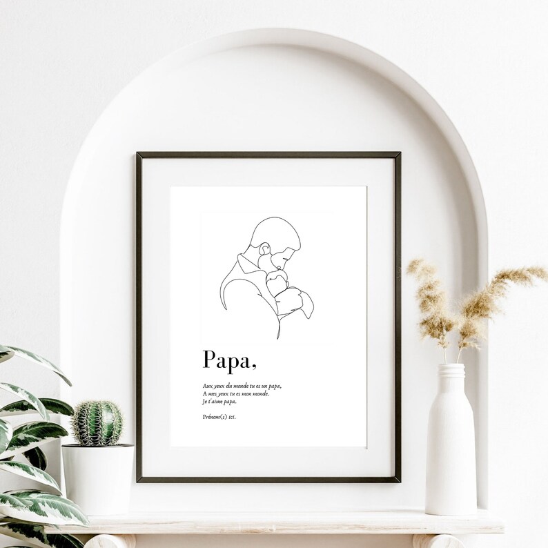 May include: Black and white line art print of a father holding a child. The print has the word "Papa" and a quote in Spanish: "A veces, para el mundo, tu eres un papa. A veces, para tu mundo, tu eres su mundo.  Yo te llamo papa."  The quote is attributed to "Proverbs(3) etc."