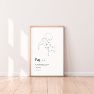 May include: A black and white line drawing of a father holding a child. The text "Papa" is below the drawing, along with a quote in French that translates to "In the eyes of the world you are a father, to me you are my whole world. I love you, Papa."