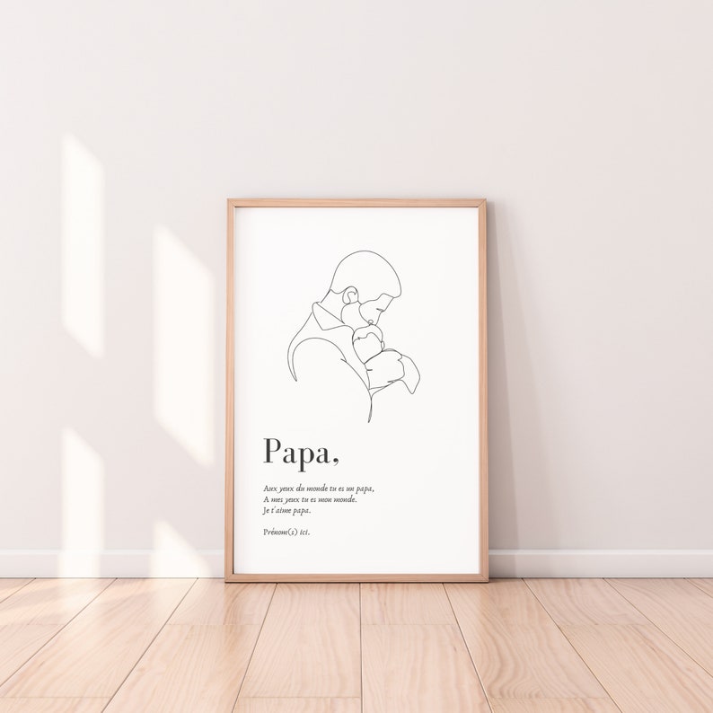 May include: A black and white line drawing of a father holding a child. The text "Papa" is below the drawing, along with a quote in French that translates to "In the eyes of the world you are a father, to me you are my whole world. I love you, Papa."