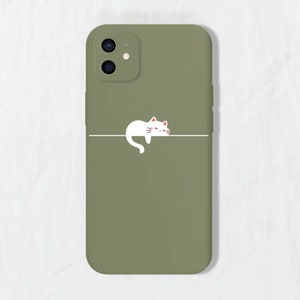 May include: A green phone case featuring a white cat illustration sleeping on a line. The case has a camera cutout with two lenses.