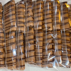 16 Graham Crackers Dipped in your choice of Premium Chocolate! Milk, Dark or White, Custom Orders!