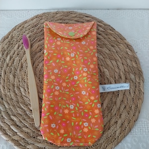 Toothbrush and toothpaste case, toothbrush, pouch