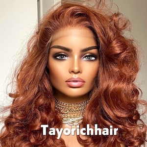 May include: A mannequin head with a copper-colored, curly wig. The wig has a lace front and is styled with voluminous curls. The mannequin is wearing a gold necklace. The text "Tayorichhair" is displayed on the image.