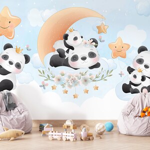 Lindo fondo de pantalla con pandas bebés durmiendo y jugando bajo la luna sobre nubes esponjosas