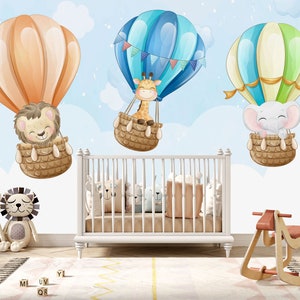 Cute children's wallpaper with cartoon animals flying in hot air balloons thru the clouds