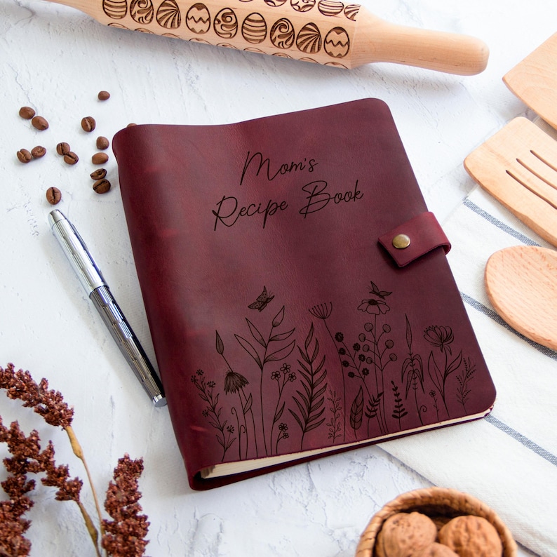 Burgundy personalized leather recipe binder with floral engraving, elegant cookbook journal