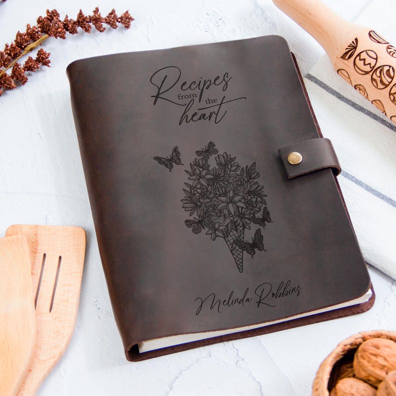 Dark brown personalized recipe book with floral bouquet engraving, custom leather cookbook, family recipes binder gift for mom and newlyweds