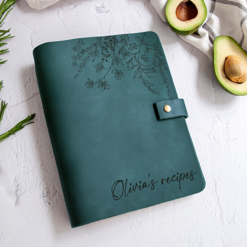 Dark teal leather recipe journal with botanical engraving, personalized cookbook for family recipes