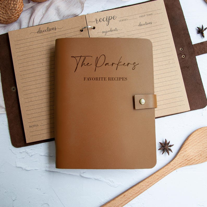 Caramel leather recipe binder opened with refill recipe pages, personalized cookbook organizer, custom family recipes journal