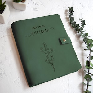 Leaf green recipe book with floral engraving and custom family name, personalized cookbook