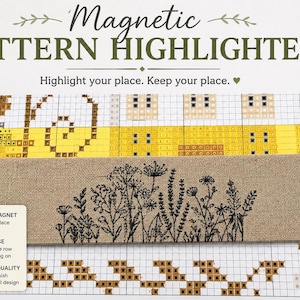 Puede incluir: Un resaltador de patrones magnético rectangular con acabado de aspecto de lino color canela y un estampado floral botánico negro. La herramienta se coloca sobre una cuadrícula de punto de cruz. El texto incluye "STRONG MAGNET," "EASY TO USE," y "PREMIUM QUALITY."