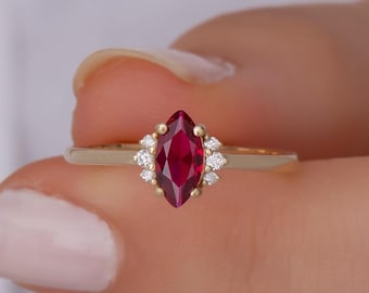 14K Gold Marquise Ruby Ring with Diamond Accents