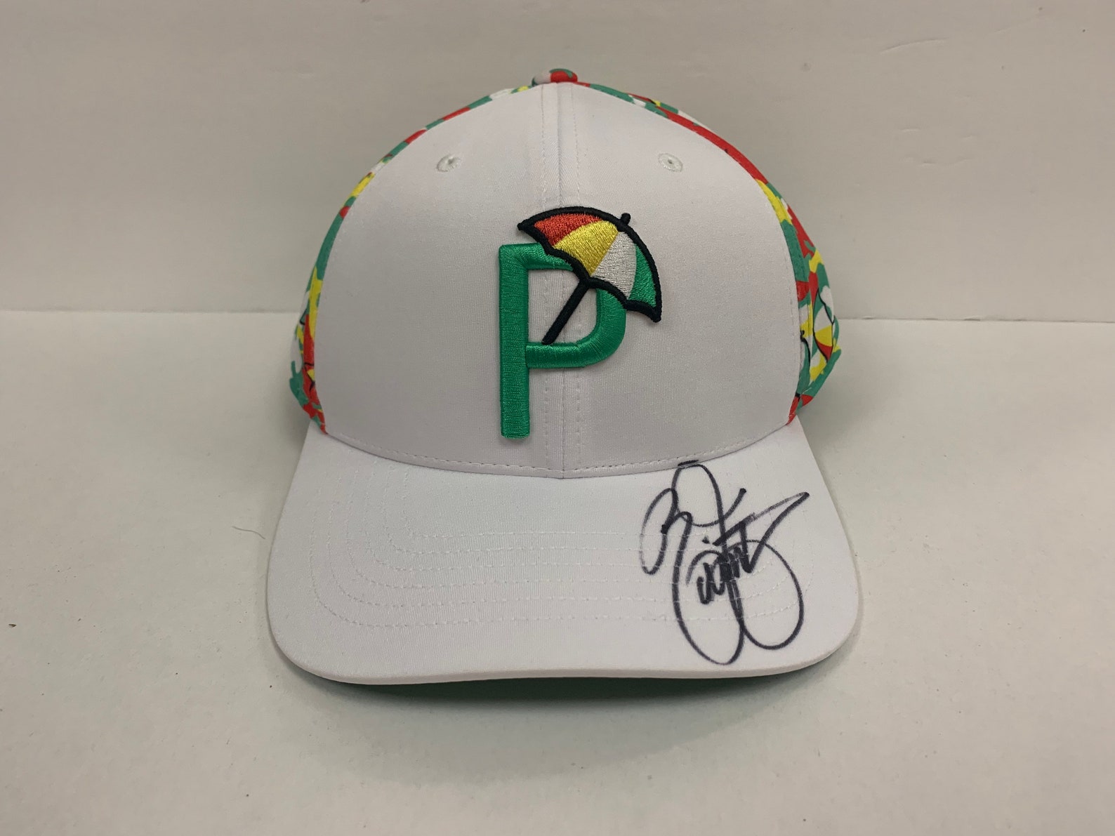 what does the p on rickie fowler's hat stand for