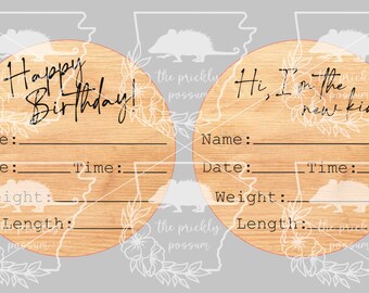 May include: Two wooden baby announcement circles with a hedgehog design. The first circle says "Happy Birthday!" and has spaces for the baby's name, date, time, weight, and length. The second circle says "Hi, I'm the new kid..." and has spaces for the baby's name, date, time, weight, and length.