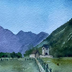 May include: Watercolour painting of a mountain landscape with a church. The scene features a range of purple mountains, a green hillside, and a small church with a tower. A wooden fence runs across the foreground.