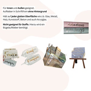 May include: An assortment of wedding and event decorations, including champagne flutes with gold lettering, name tags, and a sign on a small easel. The image also shows decorative boxes and stickers.