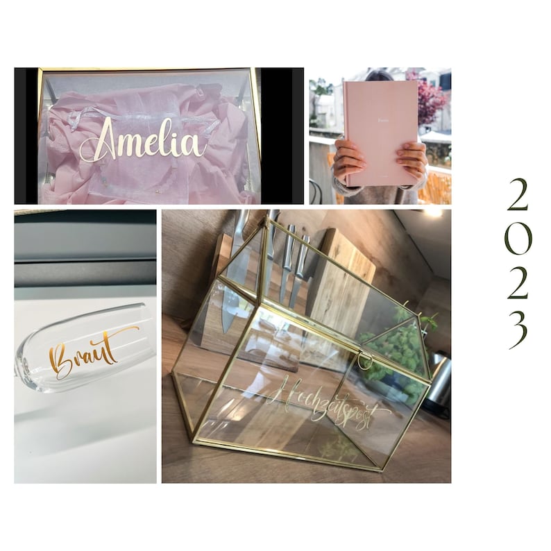 May include: A collection of wedding-themed items. Includes a clear glass box with the name "Amelia" in gold lettering, a pink book, a champagne flute with "Braut" in gold, and a geometric glass terrarium with gold trim.