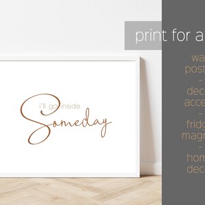 May include: White framed print with the text "i'll go inside Someday" in brown cursive script.