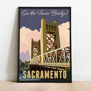 May include: A vintage travel poster featuring the Tower Bridge in Sacramento, California. The poster has a blue, pink, and yellow color scheme and the text "See the Tower Bridge! Visit Sacramento".