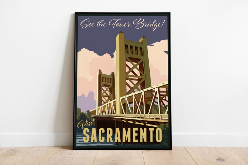 May include: A vintage travel poster featuring the Tower Bridge in Sacramento, California. The poster has a blue, pink, and yellow color scheme and the text "See the Tower Bridge! Visit Sacramento".