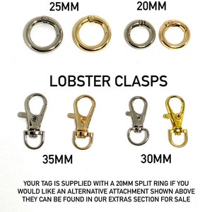 May include: A set of silver and gold O-rings and lobster clasps in various sizes. The O-rings are 20mm and 25mm in diameter. The lobster clasps are 30mm and 35mm in length.  "Your tag is supplied with a 20mm split ring if you would like an alternative attachment shown above they can be found in our extras section for sale."