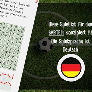 May include: A word search puzzle with a soccer ball and the German flag. The text reads "This game is designed for the garden!!! The game language is German."