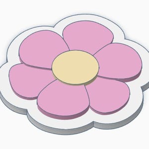 May include: A three-dimensional flower-shaped object with a white outline and a light gray shadow. The flower has five pink petals surrounding a yellow center. The design is simple and cartoon-like.