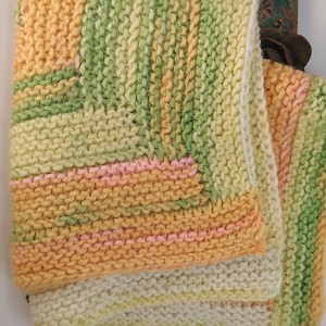 Knited colored blanket for dolls