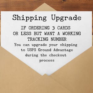 May include: A white card with the text "Shipping Upgrade" in a brown envelope. The card's text explains how to upgrade shipping to USPS Ground Advantage for orders of 3 cards or less to get a tracking number.