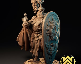 May include: A brown monochromatic miniature figurine of a knight in ornate armor, wearing a plumed helmet, holding a long staff, and standing behind a large oval shield featuring a sun face relief and a bird emblem on a circular tiled base.