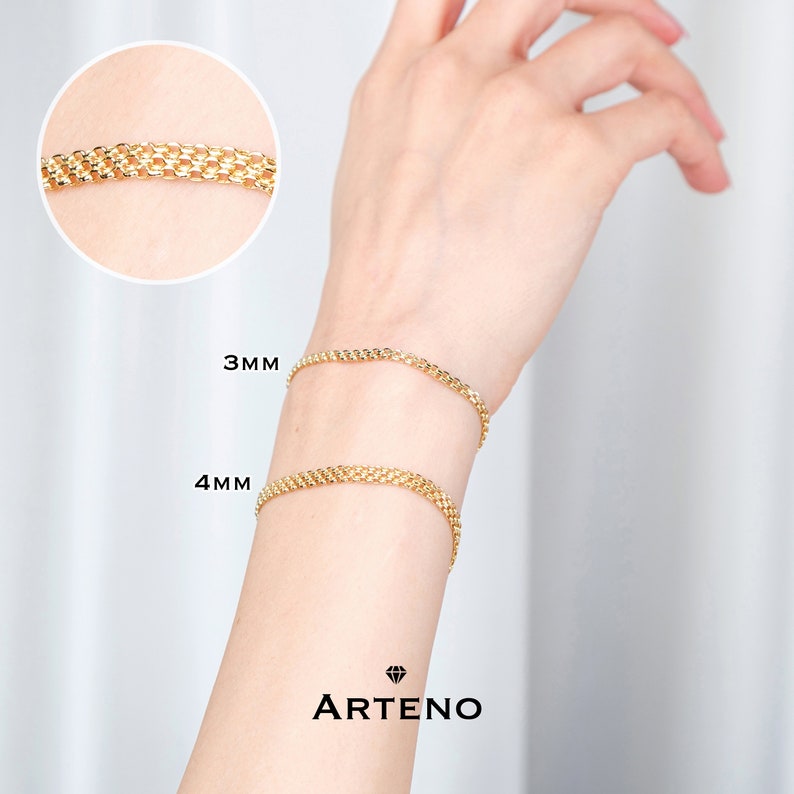 K&ouml;nnte beinhalten: Zwei goldene Kettenarmb&auml;nder am Handgelenk einer Person. Die Armb&auml;nder sind 3 mm und 4 mm breit. Der Text "ARTENO" ist unterhalb der Armb&auml;nder sichtbar.