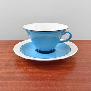 Arabia Harlekin Turquoise. Rare tea cup with saucer. Designed by Inkeri Leivo, Finland 1980s.