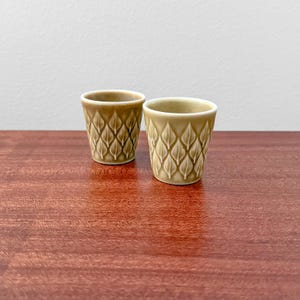 Bing & Grøndahl Relief. Pair of egg cups. Designed by Jens Harald Quistgaard, Denmark 1950s.