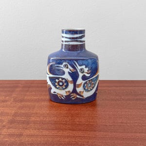 Royal Copenhagen Baca. Rare small blue vase with stylised bird motif. Designed by Nils Thorsson, Denmark 1960s.