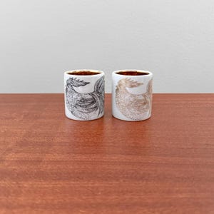 Arabia Kukko. Pair of rare egg cups. Designed by Gunvor Olin-Grönqvist, Finland 1960s.