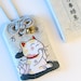 see more listings in the OMAMORI - All Goes Well section