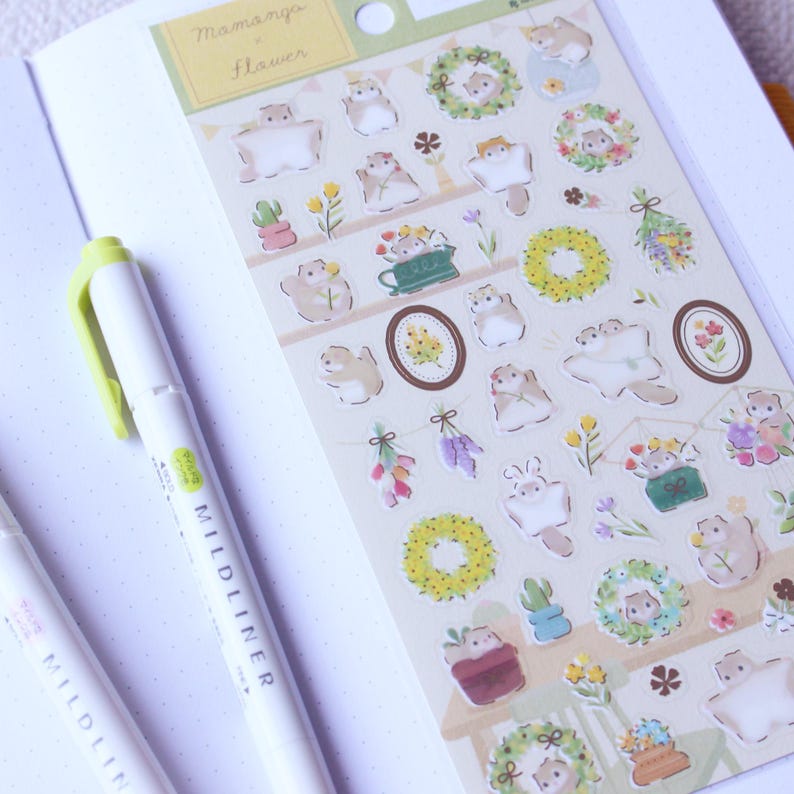 Japanese transparent PET sticker sheets with many cute flying squirrel and flower stickers with pretty gold foil details. Meet the cute Japanese flying squirrels enjoying relaxing times as the florist making flower arrangements like bouquets and wreaths for spring and summer. These are perfect for planners, but can be also used for example to decorate cards or gifts.