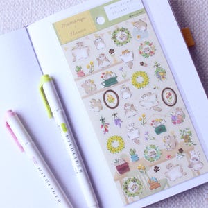 Japanese transparent PET sticker sheets with many cute flying squirrel and flower stickers with pretty gold foil details. Meet the cute Japanese flying squirrels enjoying relaxing times as the florist making flower arrangements like bouquets and wreaths for spring and summer. These are perfect for planners, but can be also used for example to decorate cards or gifts.
